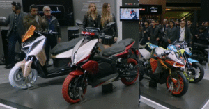 TVS EICMA 2025 showcase featuring Tangent RR, eFX three o, M1-S, and RTR HyprStunt concept bikes displayed by TVS Motor Company at Milan auto show.