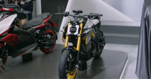 TVS EICMA 2025 showcase featuring Tangent RR, eFX three o, M1-S, and RTR HyprStunt concept bikes displayed by TVS Motor Company at Milan auto show.